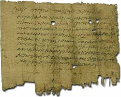A private letter on papyrus from Oxyrhynchus, written in a Greek hand of the second century AD. The holes are caused by worms.