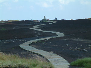 The paved surface of the Pennine Way on Black Hill