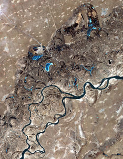 Songhua River, northeast China. Swirls and curves, showing paths the river once took, as well as oxbow lakes, are easily seen in this satellite photo.