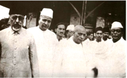 Maulana Azad, Sardar Patel (third from left, in the foreground), and other Congressmen at Wardha