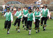 Morris dancing in the grounds of Wells Cathedral, Wells, England