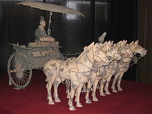 A Terracotta Army carriage with an umbrella securely fixed to the side, from Qin Shihuang's tomb, c. 210 BCE.