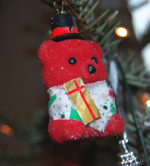 A toy bear christmas decoration.