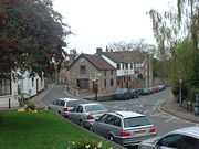 Street showing site of old toll house
