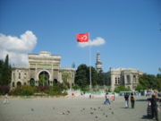 Main entrance gate of Istanbul University on Beyazıt Square, which was known as Forum Tauri in the Roman period. Beyazıt Tower, located within the campus, is seen in the background.