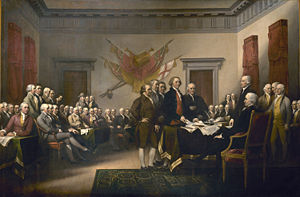 In John Trumbull's painting Declaration of Independence, the five-man drafting committee is presenting its work to the Continental Congress. Jefferson is the tall figure in the center laying the Declaration on the desk.