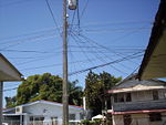 In Honduras electricity comes in to households through overhead cables. Other cables carry telephone, cable television and broadband internet.