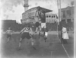 A New South Wales player marks over a West Australian opponent in the goal square at the 1933 Australian Football Carnival held at the Sydney Cricket Ground.