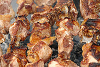 Mtsvadi (Georgian Pork Barbecue) on the grill