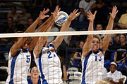 3 players performing a block