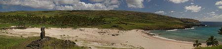 Panorama of Anakena beach, Easter Island.  The moai pictured here was the first to be raised back into place upon its ahu in 1955 by islanders using the ancient method.