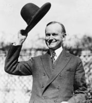 President Coolidge signed a bill granting Native Americans full U.S. citizenship. Coolidge is shown above on October 22, 1924 holding a ceremonial hat.