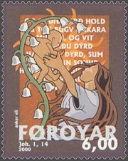 Christmas stamp 2000 from Faroe Island, featuring quote from John 1:14, designed by Anker Eli Petersen.