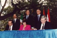 Signing of the initialization of the implementation of the North American Free Trade Agreement in 1992 by representatives of the Canadian, Mexican, and United States governments.