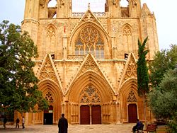 The Lala Mustafa Pasha Mosque in Famagusta (Gazimağusa). Formerly Τhe Saint Nicolas Cathedral prior to its conversion in 1571. Tourism remains an important source of revenue for Northern Cyprus.