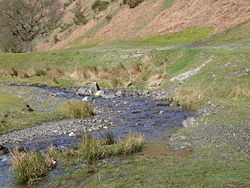 The depositional slip off slope is on the left whilst there is a small river cliff to the right