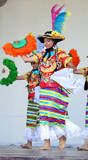 Nicaraguan women wearing the Mestizaje costume, which is a traditional costume worn to dance the Mestizaje dance. The costume demonstrates the Spanish influence on Nicaraguan clothing.