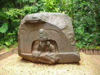 Altar 5 from La Venta.  The inert were-jaguar baby held by the central figure is seen by some as an indication of child sacrifice.  In contrast, its sides show bas-reliefs of humans holding quite lively were-jaguar babies.