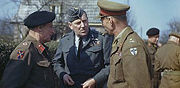 Montgomery (left), Air Marshal Sir Arthur Coningham (centre) and the Commander of the British Second Army, Lieutenant General Sir Miles Dempsey, talking after a conference in which Montgomery gave the order for Second Army to begin the crossing of the Rhine.