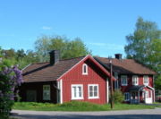 Traditional Swedish rural house, painted in the traditional Swedish Falu red.
