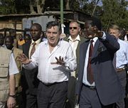 Gordon Brown touring the slums of Nairobi, Kenya in 2005