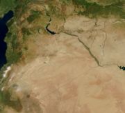 Satellite image of Syria (border lines added).