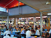 Enjoying Singaporean cuisine. Hawker centres and kopi tiams are evenly distributed.