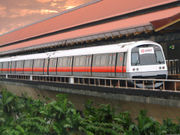 A C751B train at Eunos MRT Station on the Mass Rapid Transit (MRT) system, one of three heavy rail passenger transport lines in Singapore.