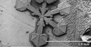 The first of a magnification series of a snow crystal (view the entire series) using a low temperature scanning electron microscope