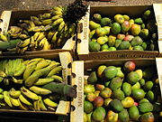 Freshly harvested mangoes and bananas at a fruit stand on the island of Maui, Hawaii