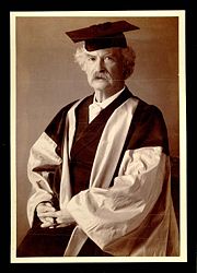 Mark Twain in his gown (scarlet with grey sleeves and facings) for his DLitt degree, awarded to him by Oxford University