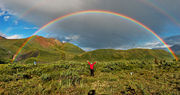 Semi-circle double rainbow (second one barely discernible) in Wrangell-St. Elias National Park, Alaska.