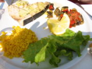 Swordfish in olive oil with ratatouille and saffron rice