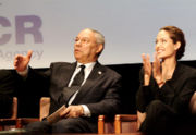 Jolie with Colin Powell in Washington, D.C., June 2004.