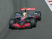 A Vodafone McLaren-Mercedes driven by Lewis Hamilton.