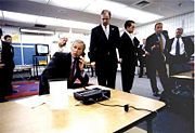 U.S. President George W. Bush is briefed on the World Trade Center attack.