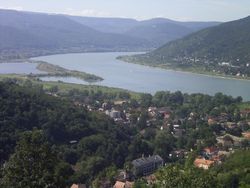 The Danube Bend is a curve of the Danube in Hungary, near the city of Visegrád. The Transdanubian Medium Mountains lie on the left bank, while the Northern Medium Mountains on the right.