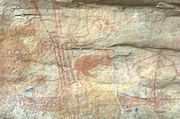 Ancient aboriginal rock painting of a wallaby in Kakadu National Park in Northern Australia.