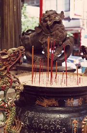A Taoist Temple in Taiwan. The religious practice of Jingxiang, note images of the Fu Dog and Dragon can be seen.