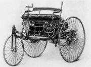 A photograph of the original Benz Patent Motorwagon, first built in 1885 and awarded the patent for the concept
