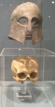 Greek Corinthian Helmet and the skull reportedly found inside it from the Battle of Marathon, now residing in the Royal Ontario Museum, Toronto.