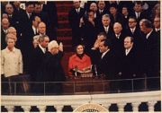 Nixon is sworn in as the 37th President on January 20, 1969, with the new First Lady, Pat, holding the family Bibles.