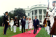 The Fords escort the Nixons across the South Lawn of the White House to the waiting presidential helicopter before Gerald Ford takes the oath of office, August 9, 1974