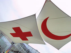 The Red Cross and the Red Crescent emblems, the symbols from which the Movement derives its name.