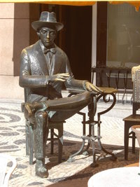 Bronze statue of poet Fernando Pessoa in the Café A Brasileira, in the Chiado neighbourhood.