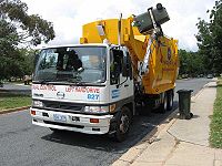 A recycling truck collecting the contents of a recycling bin in Canberra, Australia