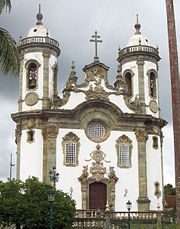Hints of Rococo can be discerned in the churches by the Portuguese-Brazilian master Aleijadinho.