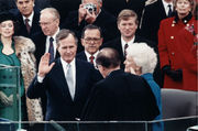 Chief Justice William Rehnquist administering the oath of office to Bush during Inaugural ceremonies at the United States Capitol, January 20, 1989.