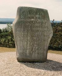 This stone on Brownsea Island commemorates the first scout camp.