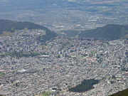Northern Quito as seen from the Telefériqo (Aerial tramway) Station at Cruz Loma (part of the Pichincha mountain complex at about 13,123 ft; 4,000 m, ). Lots of buildings (10 or more stories) have been constructed around the financial center of the city throughout the last 35 years.